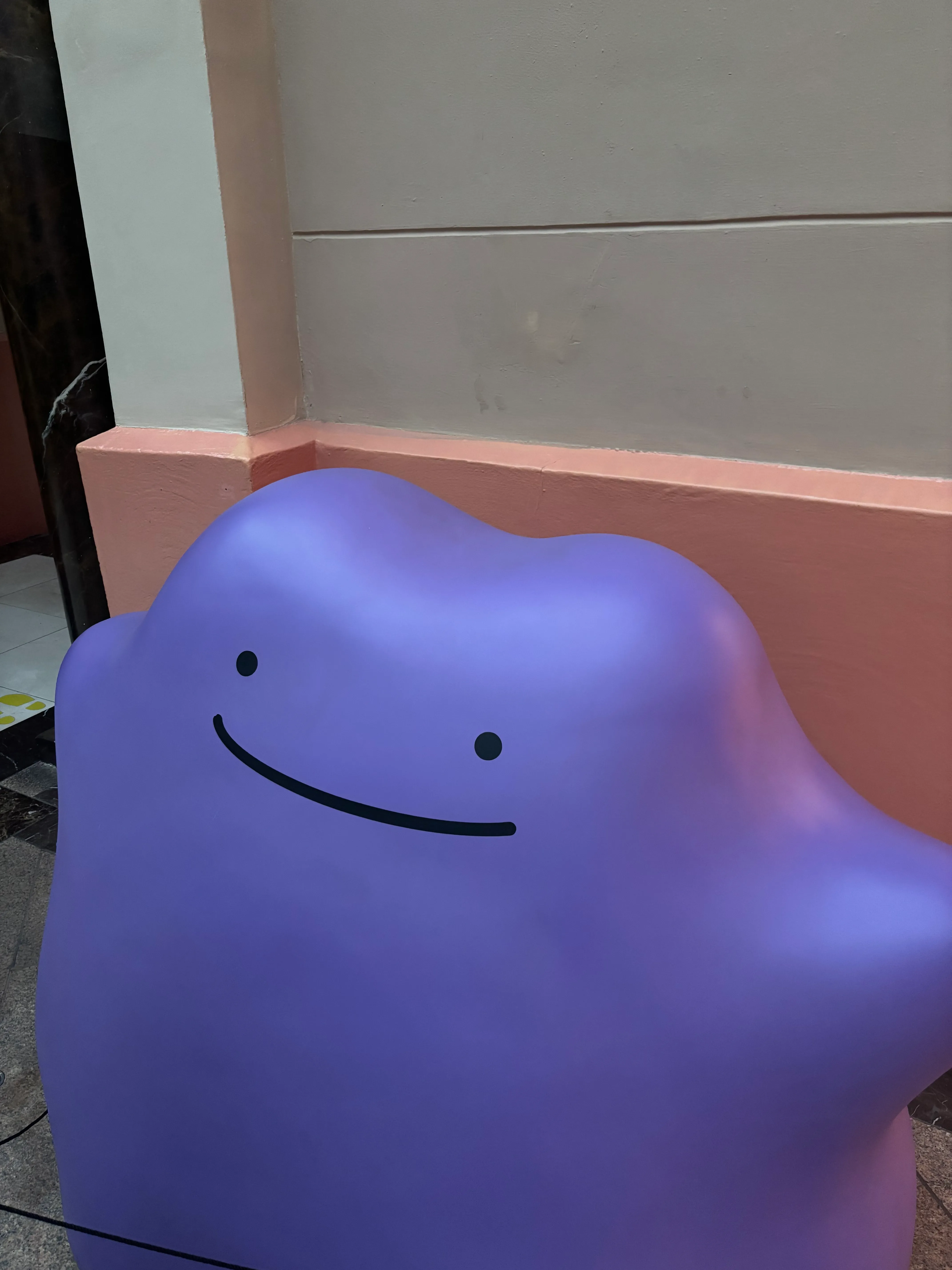 Close up view of the Pokemon, Ditto, smiling, photographed at Lotte World in Seoul, Korea