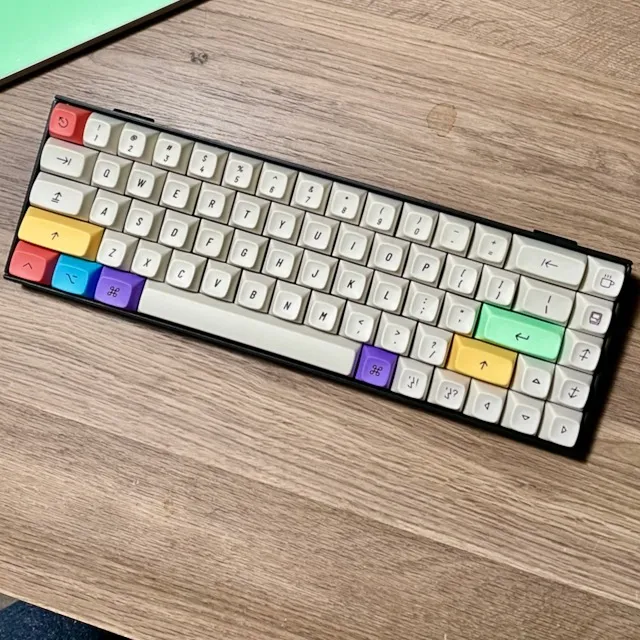 Keychron K6 mechanical keyboard with cream alpha keycaps and multicolored accent keys